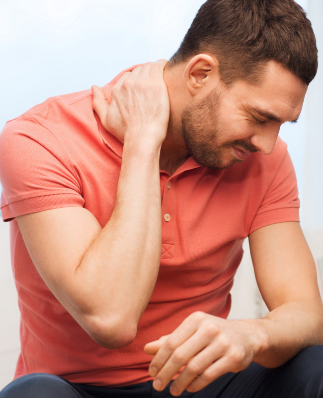 The image shows a man appearing unhappy with his neck pain.