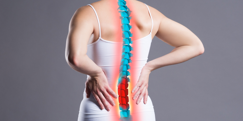 Image illustration of a woman having lower back pain due to spinal fractures.